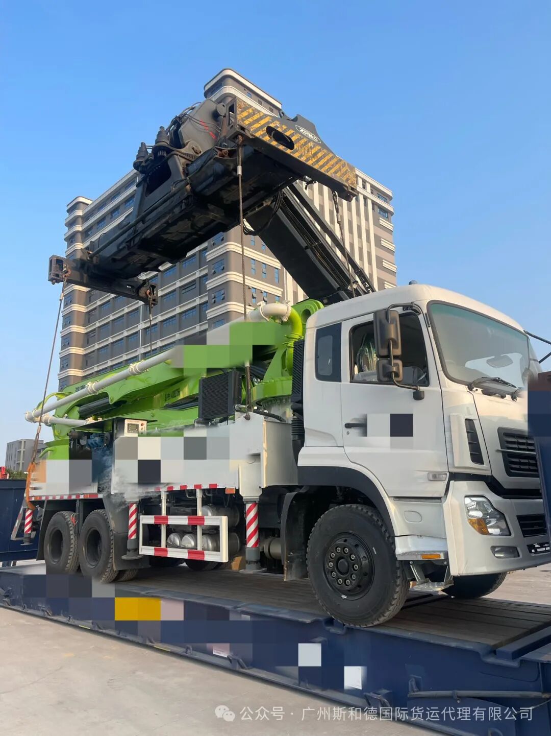 Fleet of heavy trucks queued for secure Ro-Ro transport to African ports